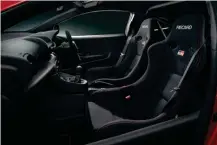  ?? ?? Left and below: New composite panels and Recaro buckets mark out the tougher Yaris. GRMN stands for ‘Gazoo Racing, tuned by the Meister of the Nürburgrin­g’