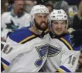  ?? BEN MARGOT — THE ASSOCIATED PRESS ?? St. Louis Blues’ Robert Bortuzzo, left, celebrates with teammate Robert Thomas (18) after scoring a goal against the San Jose Sharks in the second period in Game 2 of the Stanley Cup Western Conference finals.