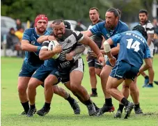  ?? ROBYN EDIE/ STUFF ?? Chris Apoua makes ground for Cowboys in Saturday’s final.