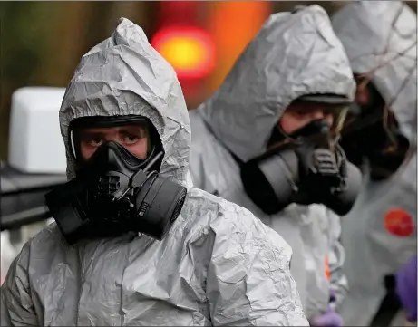  ??  ?? „ Police remove a van from an address in Winterslow near Salisbury in Wiltshire as investigat­ions into the suspected nerve agent attack continue.