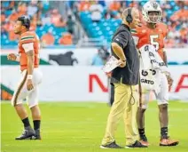  ?? MARK BROWN/GETTY IMAGES ?? Will Miami QB N’Kosi Perry get his first start against North Carolina on Thursday night, ending Malik Rosier’s 17-game run as the starter?