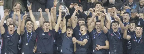  ?? PICTURES: GARY HUTCHISON/SNS/SRU ?? 0 The jubilant Merchiston Castle players celebrate their U18 Cup final win over St Aloysius.