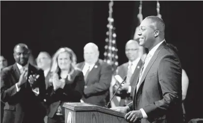  ?? JEN RYNDA/BALTIMORE SUN MEDIA GROUP ?? Howard County Executive Calvin Ball smiles after taking the oath of office Monday at Howard High School in Ellicott City.