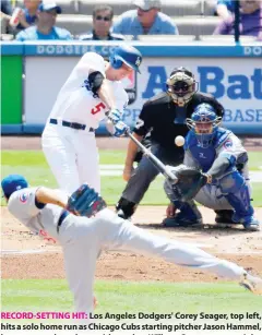  ??  ?? RECORD-SETTING HIT: Los Angeles Dodgers' Corey Seager, top left, hits a solo home run as Chicago Cubs starting pitcher Jason Hammel, bottom, watches along with catcher Willson Contreras, top right, and home plate umpire Larry Vanover during the first...