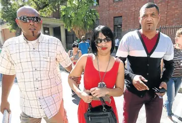  ?? Picture: ESA ALEXANDER ?? END IN SIGHT: Celeste and Morne Nurse, centre and right, with a family member, left, outside the Cape Town Magistrate’s Court on Friday. They want their long-lost daughter to come home as soon as possible