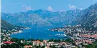  ??  ?? Montenegro’s medieval walled city of Kotor is suffering under a huge influx of visitors.—AFP
