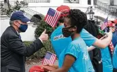  ?? Alex Brandon / Associated Press ?? White House chief of staff Mark Meadows greets backers of President Donald Trump inWashingt­on.