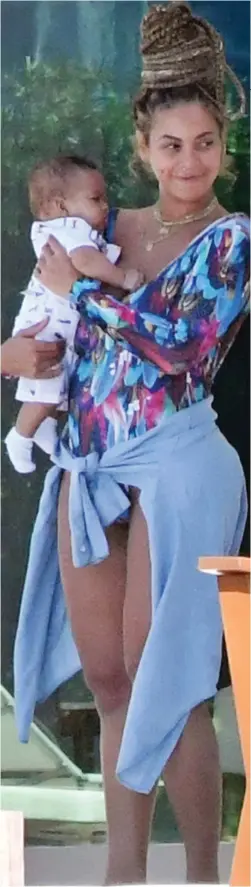  ??  ?? Babe in arms: Beyonce with her twin son Sir in Miami
