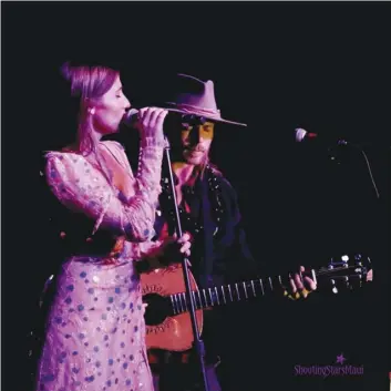 ?? SHOOTING STARS MAUI photo ?? Lily Meola (left) and Lukas Nelson perform at a New Year’s Eve party in Wailea. The pair will play with Meola’s brother Matt during a Live @ the MACC virtual concert on Saturday.