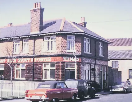  ??  ?? The Mars pub, Temple Street, Landport, with some, what would now be, vintage cars.