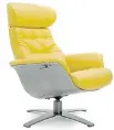  ??  ?? This recliner’s yellow leather upholstery will add a stylish pop of colour to any contempora­ry decor.