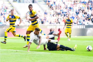  ??  ?? Inter Milan’s Argentine forward Mauro Icardi (bottom left) collides with Parma’s Italian goalkeeper Luigi Sepe (right) during the Italian Serie A football match Inter Milan vs Parma at the San Siro stadium in Milan. — AFP photo