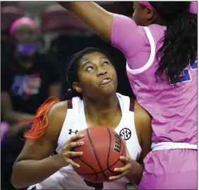  ?? (AP/Sean Rayford) ?? Forward Aliyah Boston (left) and South Carolina were one of the four teams predicted for No. 1 seeds in the NCAA Women’s Tournament according to the NCAA Division I Women’s Basketball Committee’s reveal this week.