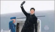  ?? AP ?? Canadian Prime Minister Justin Trudeau waves as he departs for Davos for the annual World Economic Forum on Monday.