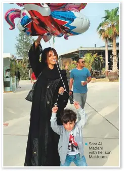  ??  ?? Sara Al Madani with her son Maktoum.
