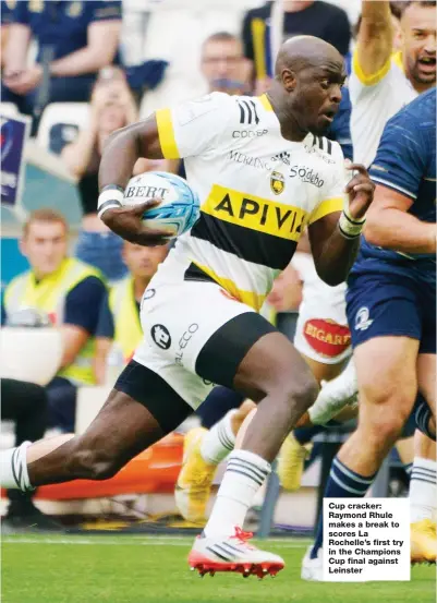  ?? ?? Cup cracker: Raymond Rhule makes a break to scores La Rochelle’s first try in the Champions Cup final against Leinster