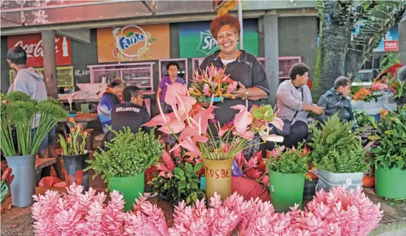  ?? Photo: ?? Nina Tuimouta displaying her flowers at the Suva market on May 1, 2020.