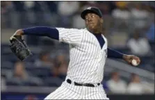  ?? ADAM HUNGER — THE ASSOCIATED PRESS ?? New York Yankees relief pitcher Aroldis Chapman delivers a pitch during the ninth inning of a baseball game against the Boston Red Sox on Sunday in New York. The Yankees won 3-1.