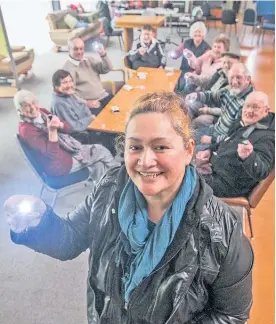  ?? Photo / Paul Taylor ?? Ani Carroll, from Age Concern in Flaxmere, is encouragin­g Hawke’s Bay’s elderly residents to carry a safety alarm.