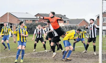  ??  ?? Action from Shepshed Dynamo’s 2-1 win over Sporting Khalsa. Picture by Steve Straw.