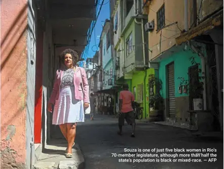  ?? ?? Souza is one of just five black women in Rio’s 70-member legislatur­e, although more than half the state’s population is black or mixed-race. — AFP