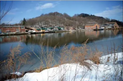  ?? TANIA BARRICKLO — DAILY FREEMAN ?? The Kingston shoreline of the Rondout Creek is seen from across the water, in Port Ewen, on Friday, Feb. 15, 2019. The Hudson River Maritime Museum is at far left. The Cornell Steamboat building is at far right.