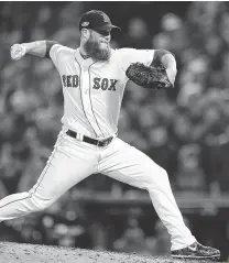  ?? Brett Coomer / Staff photograph­er ?? Red Sox closer Craig Kimbrel was the only Boston reliever to be scored upon Sunday, but he held on for the save.