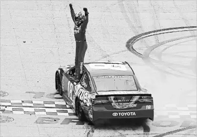  ?? JERRY MARKLAND GETTY IMAGES ?? Kyle Busch celebrates after winning the rain-delayed Monster
Energy NASCAR Cup Series Food
City 500 at Bristol Motor Speedway in Bristol, Tenn., on Monday.