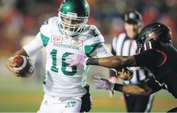  ?? THE CANADIAN PRESS ?? Saskatchew­an’s Canadian-born quarterbac­k Brandon Bridge, left, came on in relief of starter Kevin Glenn last week and led the Roughrider­s to a surprising 30-7 victory over the Calgary Stampeders. Bridge has made his mark with the Riders since being cut...