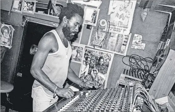  ?? Photo: Ted Bafaloukos ?? Limitless vision: Lee ‘Scratch’ Perry at the Black Ark studio, which he built in his back yard. It was subsequent­ly destroyed in a fire.