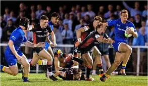  ?? ?? Team Bath (blue) in action against Hartpury in the BUCS Super Rugby competitio­n