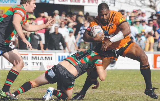  ?? Picture: MIKE BATTERHAM ?? Southport’s Aseri Laing proves a handful for the Bilambil defence in the 2010 Gold Coast Rugby League grand final.