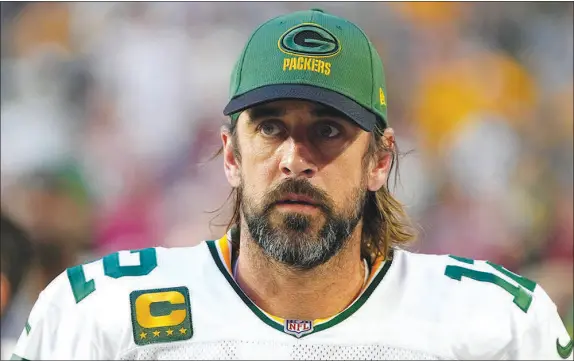  ?? RICK SCUTERI / AP ?? Green Bay Packers quarterbac­k Aaron Rodgers (12) is shown during Green Bay’s game Oct. 28 against the Arizona Cardinals in Glendale, Ariz. Rodgers is in the NFL’S COVID-19 protocol program and will miss Sunday’s game at Kansas City.