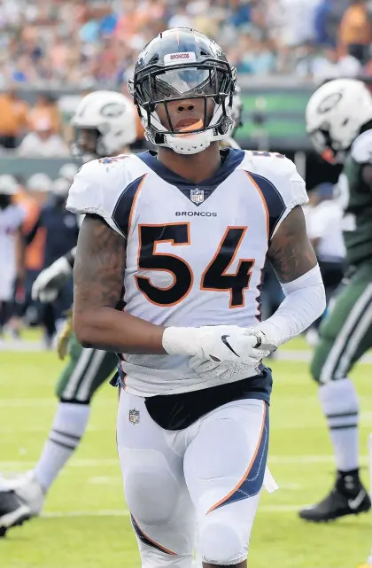  ?? BILL KOSTROUN/AP ?? The Broncos’ Brandon Marshall says with powerful offenses and rules tilted against defenses, linebacker­s have “to be able to do all of it, man.”