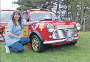  ??  ?? Mull nurse Louise Thomas with her Marie Curie Mini.
