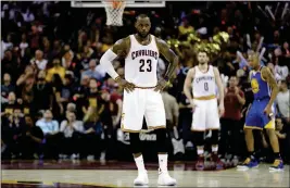  ?? ASSOCIATED PRESS ?? IN THIS JUNE 7, 2017, FILE PHOTO, CLEVELAND CAVALIERS FORWARD LEBRON JAMES (23) reacts against the Golden State Warriors during the second half of Game 3 of basketball’s NBA Finals in Cleveland. The odds are longer than a Stephen Curry 3-pointer. The...