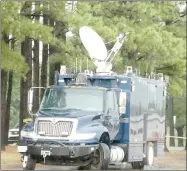  ?? LYNN KUTTER ENTERPRISE-LEADER ?? The 61st Civil Support Team out of Camp Robinson in Little Rock brought seven of its vehicles for a training exercise at Farmington Middle School. This truck with a satellite is part of a universal communicat­ion system that allows the team to link up with communicat­ions anywhere they go.