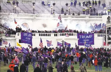  ?? Associated Press ?? PRESIDENT TRUMP’S persistent lies about the 2020 election stoked a violent mob that attacked the U. S. Capitol on Jan. 6.