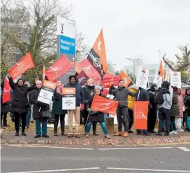  ??  ?? GMB members striking at Wexham Park Hospital in November 2019. Ref:132176-18