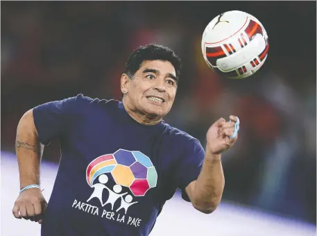  ?? FILIPPO MONTEFORTE/AFP VIA GETTY IMAGES FILES ?? Argentine soccer legend Diego Maradona, who charmed fans from South America to Italy and everywhere else the game is played, died on Wednesday at the age of 60 after suffering a heart attack.