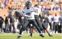  ?? AARON DOSTER/AP ?? Ravens quarterbac­k Josh Johnson threw for 304 yards and two touchdowns and an intercepti­on in a 41-21 loss to the Bengals.