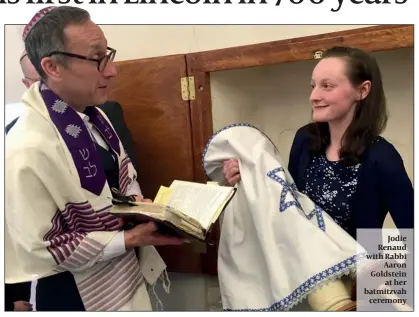  ??  ?? Jodie Renaud with Rabbi Aaron Goldstein at her batmitzvah ceremony