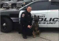  ?? KRISTI GARABRANDT — THE NEWS-HERALD ?? Eastlake officer Mike ward is excited to get to work with K-9 Axel. The department’s ability to obtain Axel and have a car outfitted for him was made possible through grants and community assistance.