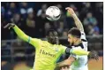  ?? EMMANUEL DUNAND/AFP PHOTO ?? TANPA KOMPROMI: Nana Asare ( kiri) duel udara dengan Kyle Walker pada leg pertama di Ghent pekan lalu (16/2).