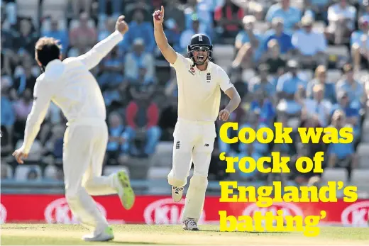  ?? / GLYN KIRK / AFP ?? England’s Alastair Cook celebrates after catching India’s captain Virat Kohli off Moeen Ali left, during the fourth day of the fourth Test in Southampto­n, on Sunday. Cook is retiring from Test cricket.