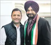  ?? PTI PHOTO ?? Congress vice-president Rahul Gandhi with Navjot Singh Sidhu at his residence in New Delhi on Sunday. Sidhu is likely to contest from Amritsar East constituen­cy.