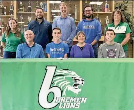  ?? PHOTO PROVIDED ?? Pictured (Front l to r): Brad Douglass (father), Aaron Douglass, Wendy Douglass (mother), Jacob Douglass (brother)
Back: Sarah Brady (Bremen cross country coach), Mark Yoder (Bremen head track coach), Ryan Sommers (Bethel head cross country coach/track assistant coach), CJ Thornton (Bremen track coach), Stephanie Pittman (Bremen track coach)