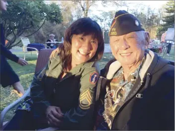  ?? Photo courtesy of Roxsanne Ruff-Tomita and Civil Beat ?? Melvin “Mike” Tomita is shown with his youngest daughter, Roxsanne RuffTomita. Tomita, who was born on Maui and graduated from Baldwin High, died after contractin­g COVID-19 at the Yukio Okutsu State Veterans Home in Hilo.