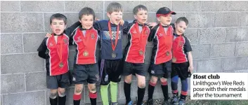  ??  ?? Host club Linlithgow’s Wee Reds pose with their medals after the tournament