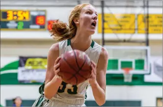  ?? Cory Rubin/The Signal (See additional photos on signalscv.com) ?? Canyon junior Lucy Collins drives into the paint in a non-league matchup with El Camino at Canyon High School Friday evening. The Cowboys lost to the Conquistad­ors 52-44.